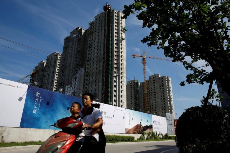 Desperate China developers dangle discounts, free cars to lure buyers